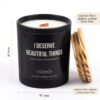 The 150g amber glass candle jar placed next to a small decor item to display its true size