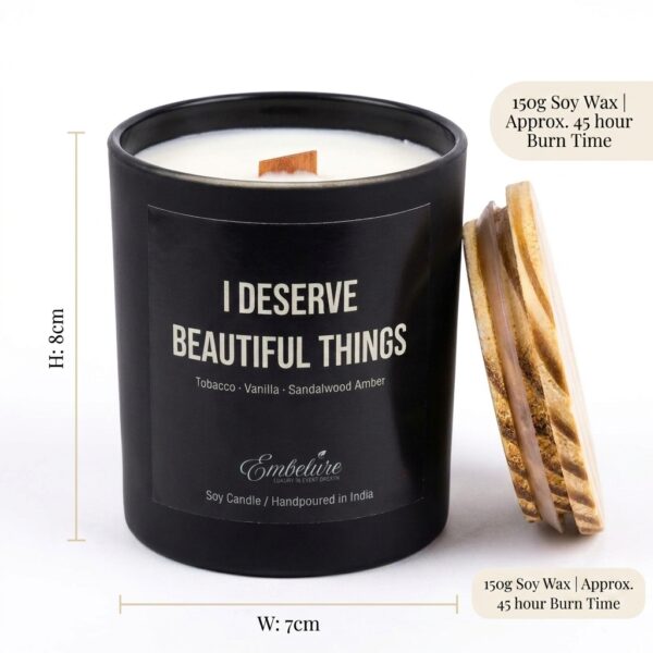 The 150g amber glass candle jar placed next to a small decor item to display its true size