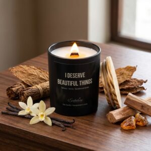 Rich fragrance ingredients showing dry tobacco leaves, vanilla beans, sandalwood sticks, and amber resin