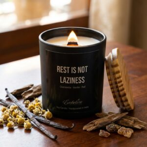Raw custom fragrance ingredients featuring vanilla pods, chamomile petals, and aromatic oud wood chips.