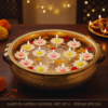 Soy wax daisy floating candle with pink centre burning on water
